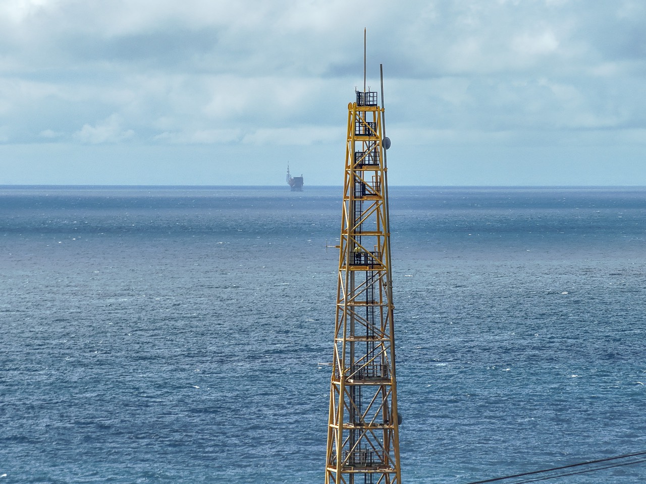 Aerial view of an offshore flare-boom structure during survey